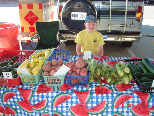 Photo of Farmers Market in downtown Shreveport.  The market opens in June each year and runs through the harvest season.  Farmer's Market features fresh homegrown produce, locally made baked items, preserves and jellies, and much more.