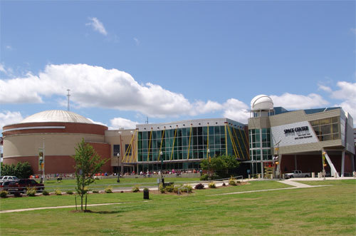 This is a photo of the Sciport Science Center on the riverfront in downtown Shreveport, Louisiana featuring IMAX dome theater and many exhibits.